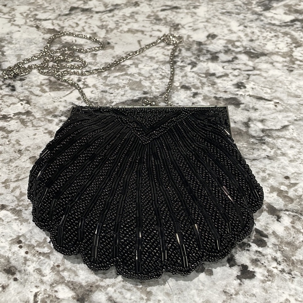 Metaphor clamshell purse by